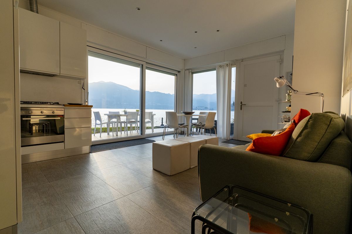 Open-plan kitchen and living area looking onto the lake