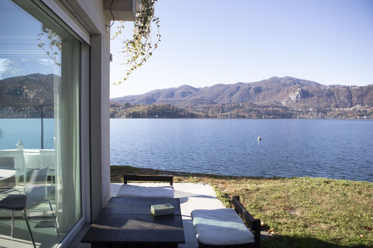 The lake framed by the sliding glass doors